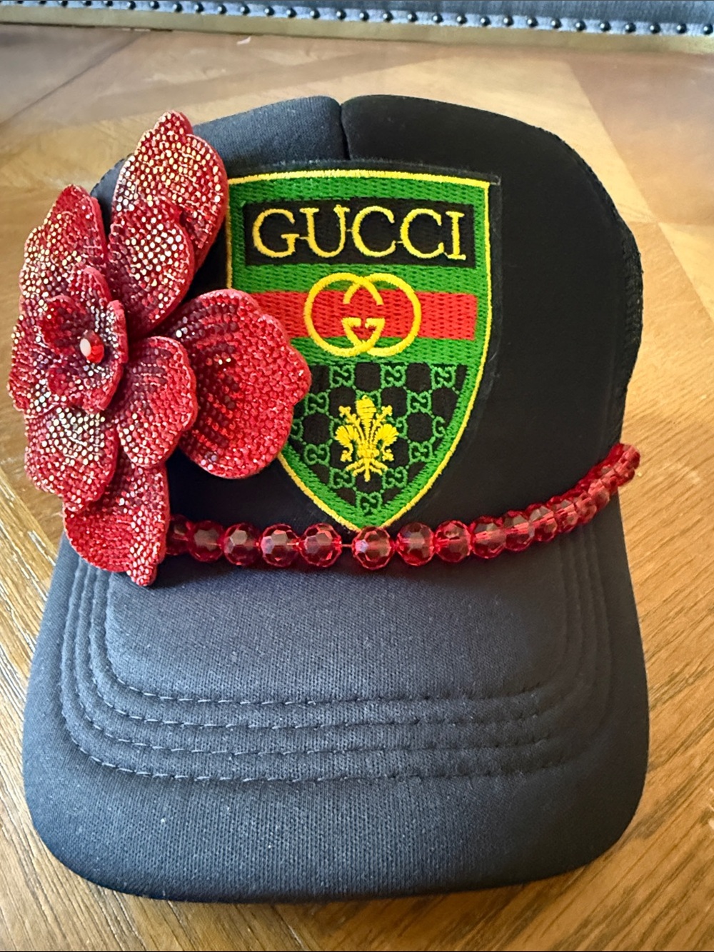 Black Embellished Cap with Red Crystal Flower